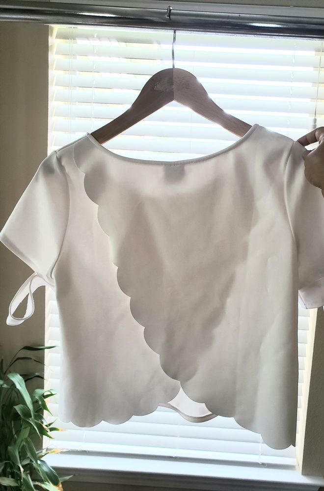 White crop top with open scallop back